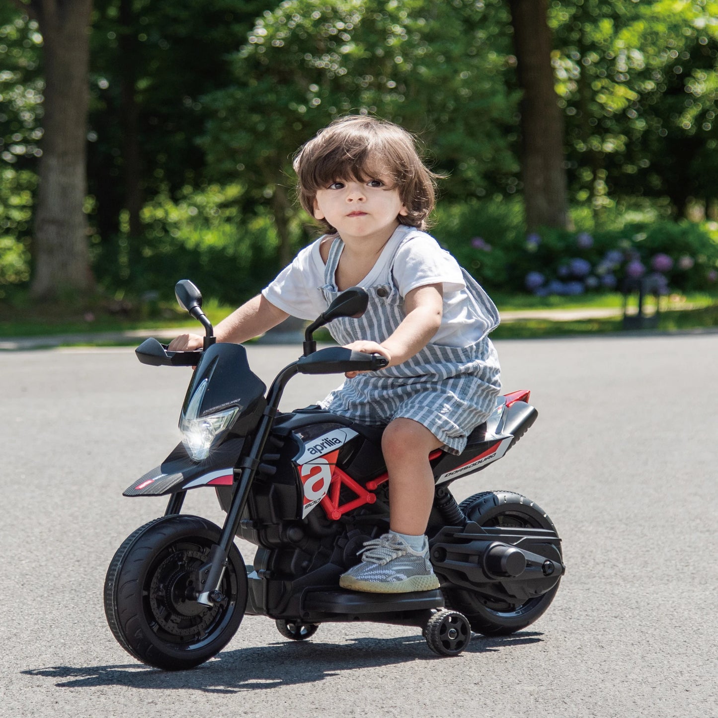 "Licensed Aprilia 12V Electric Motorcycle for Kids with Training Wheels, Spring Suspension, and Battery Powered Dirt Bike – Perfect Toy for Young Riders, Offering Safe and Exciting Outdoor Adventures for Children"